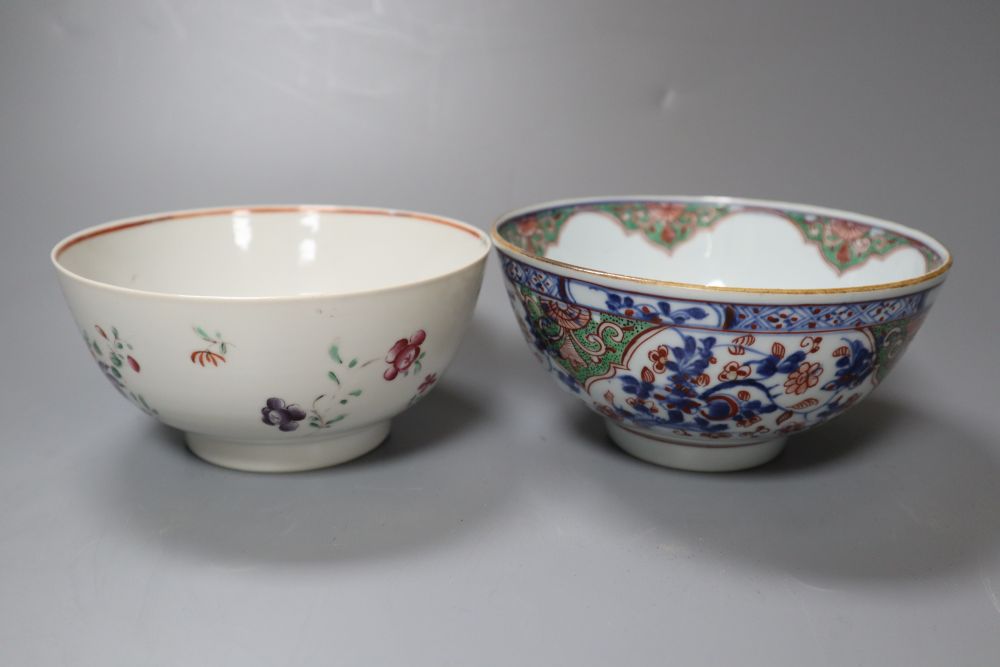 A Chinese Kangxi clobbered bowl and a Chinese Qianlong famille rose bowl